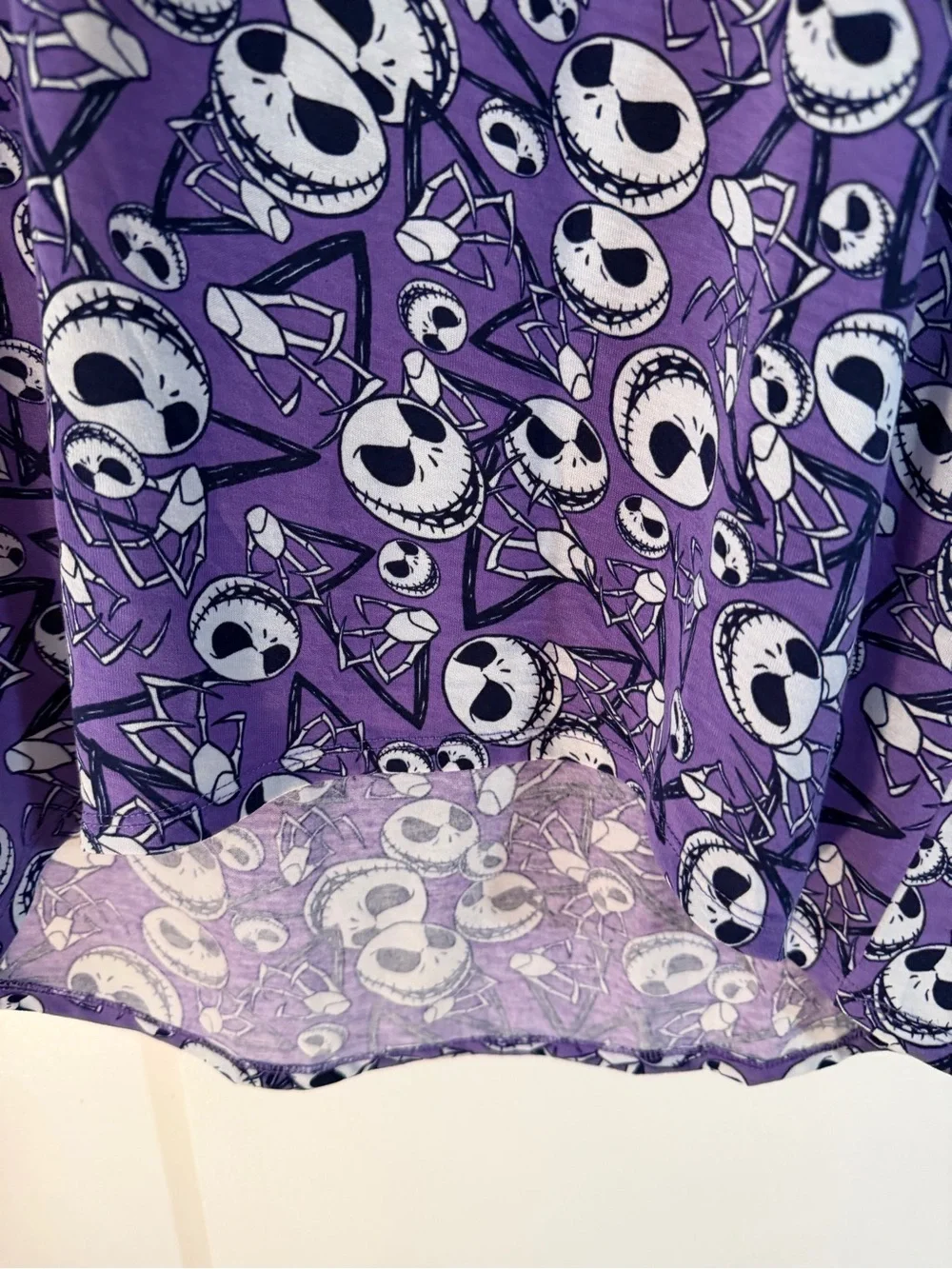 LuLaRoe Purple Short Sleeve Shirt with Black & White Skull Faces